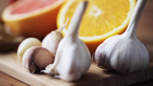 Ginger, Grapefruit, Orange And Garlic On Board