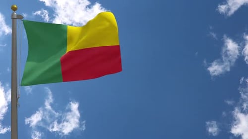 Realistic Benin Flag Waving against Blue Sky with Clouds