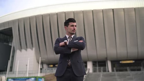 Businessman crossing his arms and waiting