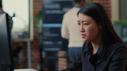 Portrait of Infuriated Software Developer Focused on Writing Code After Encountering Unexpected