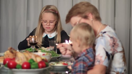 Family Enjoying Meal Together On Holidays