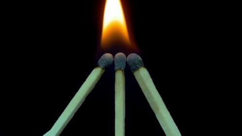 Matches Igniting and Burning with Bright Flame