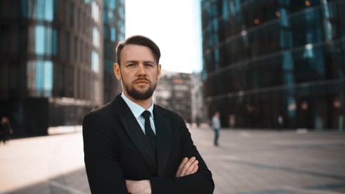 Confident Man Standing in an Urban Setting