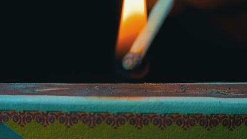 Match Igniting on Matchbox, Close-Up Shot