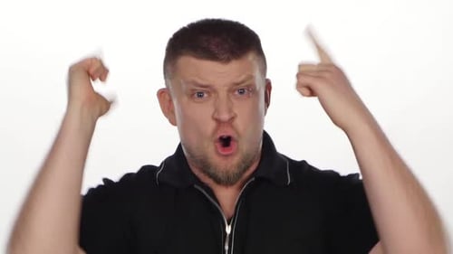 Angry Man Shouting and Gesturing Aggressively