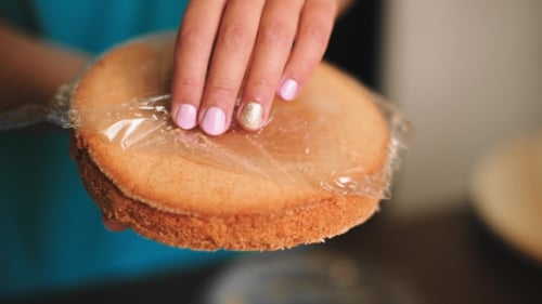 Confectioner Unpacks Semi-finished Biscuit