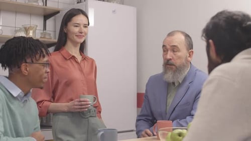 Colleagues Meeting and Discussing in the Office