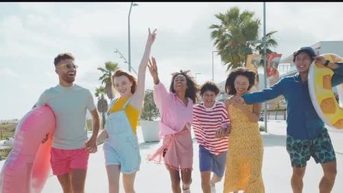 Group of friends having fun on the beach.