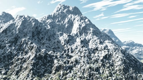Mountains In Snow And Clouds At Blue Sky
