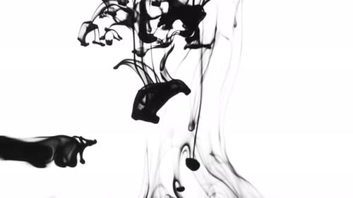 Black Ink Descending Abstractly in Clear Liquid