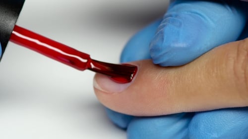 Specialist Ends The Procedure Of Manicure Uses a Polish Of Nail.