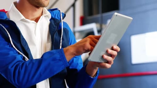 Man Using Tablet in Modern Office