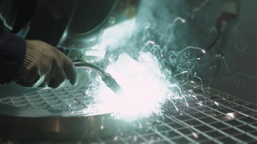 Welder Industrial Automotive Part In Factory, Hot Metal Welding On Modern Workshop