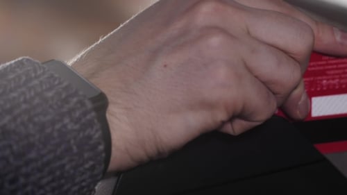 Hands With Credit Card Reader At Modern Cafe