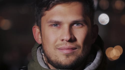 Handsome Man Tourist And Night City In The Background Portrait