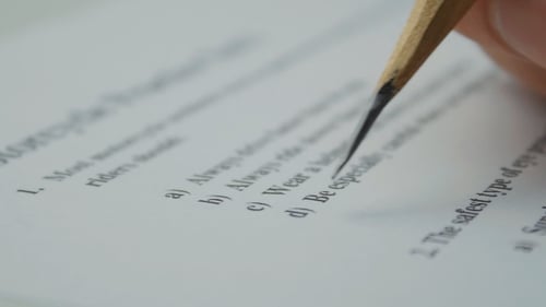 Pencil Filling in Circle on Test Paper