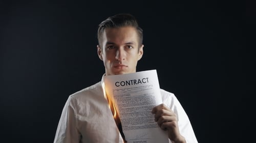 Businessman Bearning a Contract