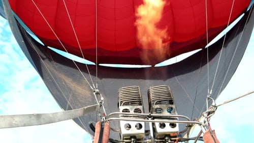 Large Gas Burner Inflates Air Balloon With Hot Air To Rise Above The Ground