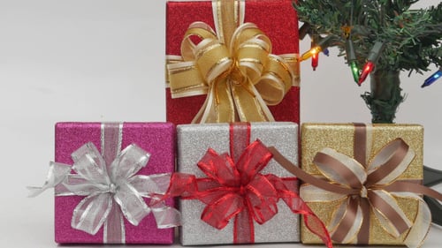 Sparkly Gift Boxes Beneath Christmas Tree