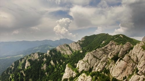 Aerial View of Rugged Mountain Range and Valley