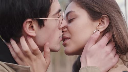 Close-Up of a Romantic Couple Kissing Tenderly