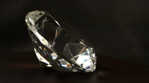 Sparkling Diamond Gemstone Slowly Rotating Close Up