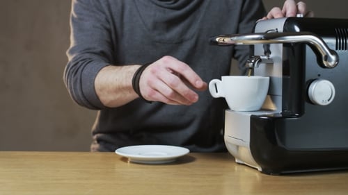 Preparing Coffee with Espresso Machine Close Up
