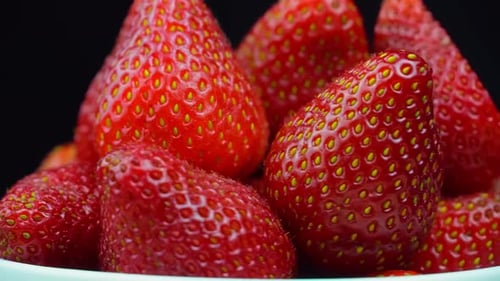 Erdbeeren Nahaufnahme, Makro. Beeren rotieren um ihre Achse.