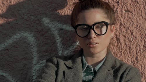 Beautiful Fashion Woman Standing Near Bricks Wall On The City Street In Grey Coat. Brunette Sexy