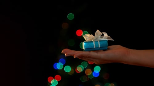 Giving a Christmas Gift with Christmas Tree Lights