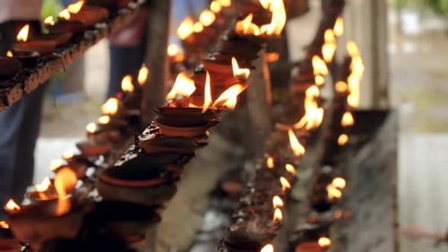 Closeup Video of Sacrad Flame on Burning Oil Lamps at Hindu Temple