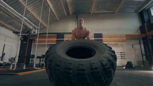 Fit Muscular Man Doing Crossfit Exercises