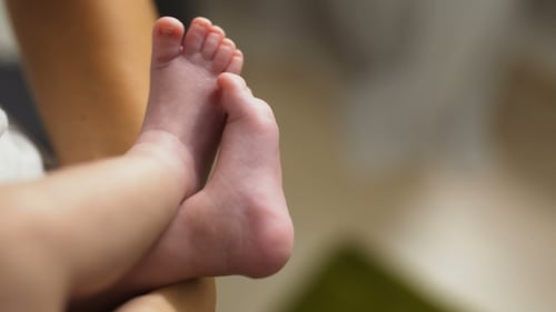 Tiny Newborn Baby Feet Close Up