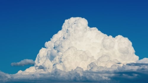 Dramatic Cumulonimbus Clouds Forming On Hot Summer Day With Blue Sky