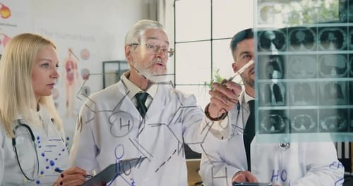 Doctors Collaborating on Medical Research in Hospital