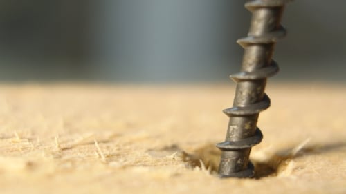 Screwing The Screw In Wood
