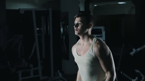 Athlete Doing Barbell Curl
