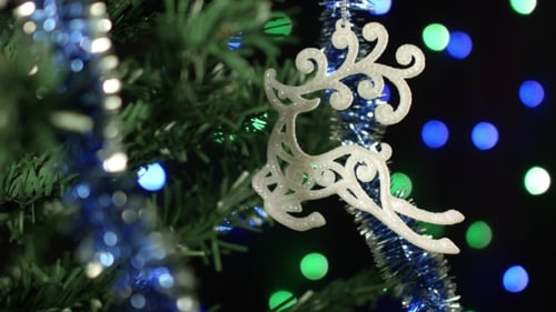 Glittering Reindeer Ornament on Christmas Tree