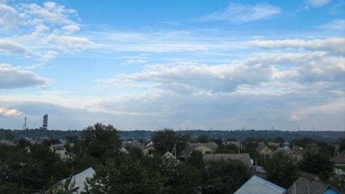 Clouds In The Sky Moving Over The Houses In The City