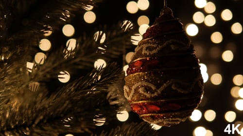 Christmas Ornament Hanging on Tree with Fairy Lights