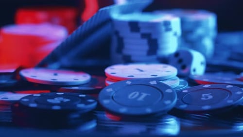 Casino Chips and Playing Cards in Motion