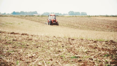 Agricultural Tractor Sowing And Cultivating Field