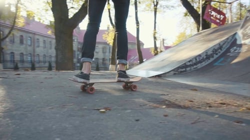 Skater Rides Skateboard in Urban Skatepark
