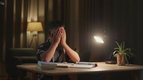 Asia Boy Feel Pain Eyestrain Rubbing Dry Irritated Eyes Fatigued From Doing Home Work