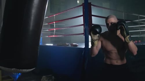 Sportsman Boxing in Smoky Studio