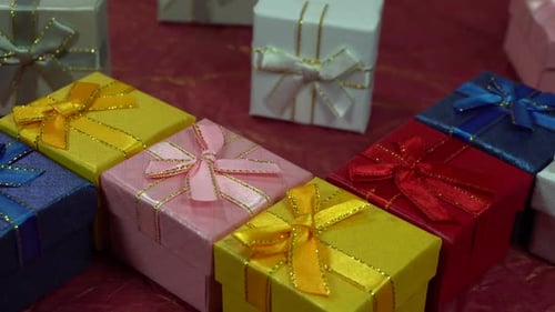 Colorful Square Gift Boxes with Ribbons and Bows