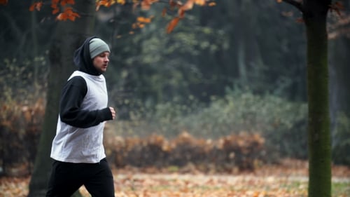 A Man Jogging, Running In Park.