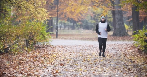 A Man Jogging, Running In Park.