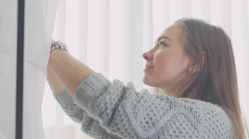 Woman Designing Fashion in Bright Room