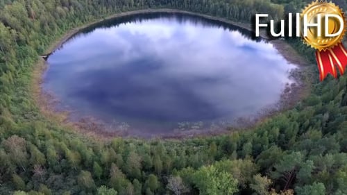 Aerial View on Beautiful Round Lake in a Forest